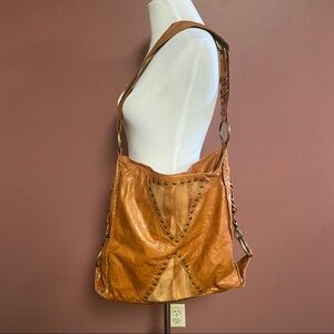 Tikabella tan shoulder bag with snakeskin patches grommet detail